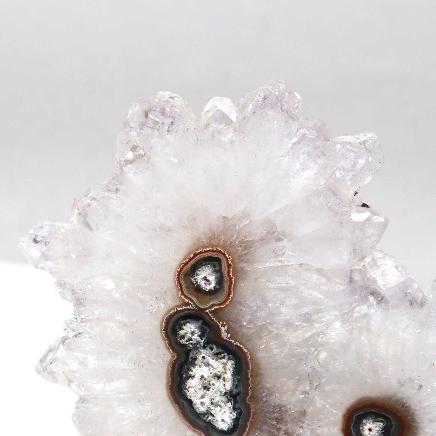 Large stalactite slice white quartz, see-through agate in blue in brown shades