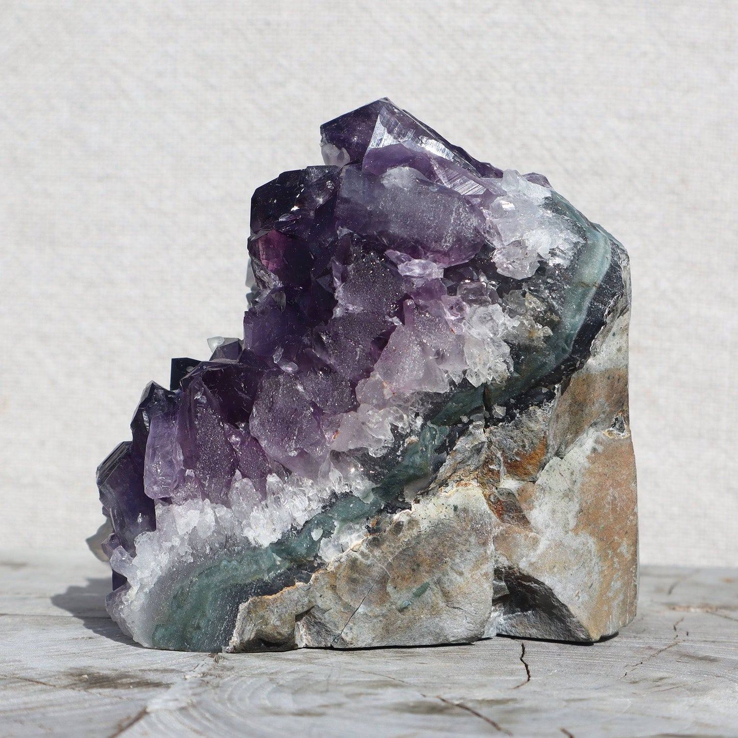 Raw_amethyst_quartz_crystals_calcite_cluster - Deepest_Earth