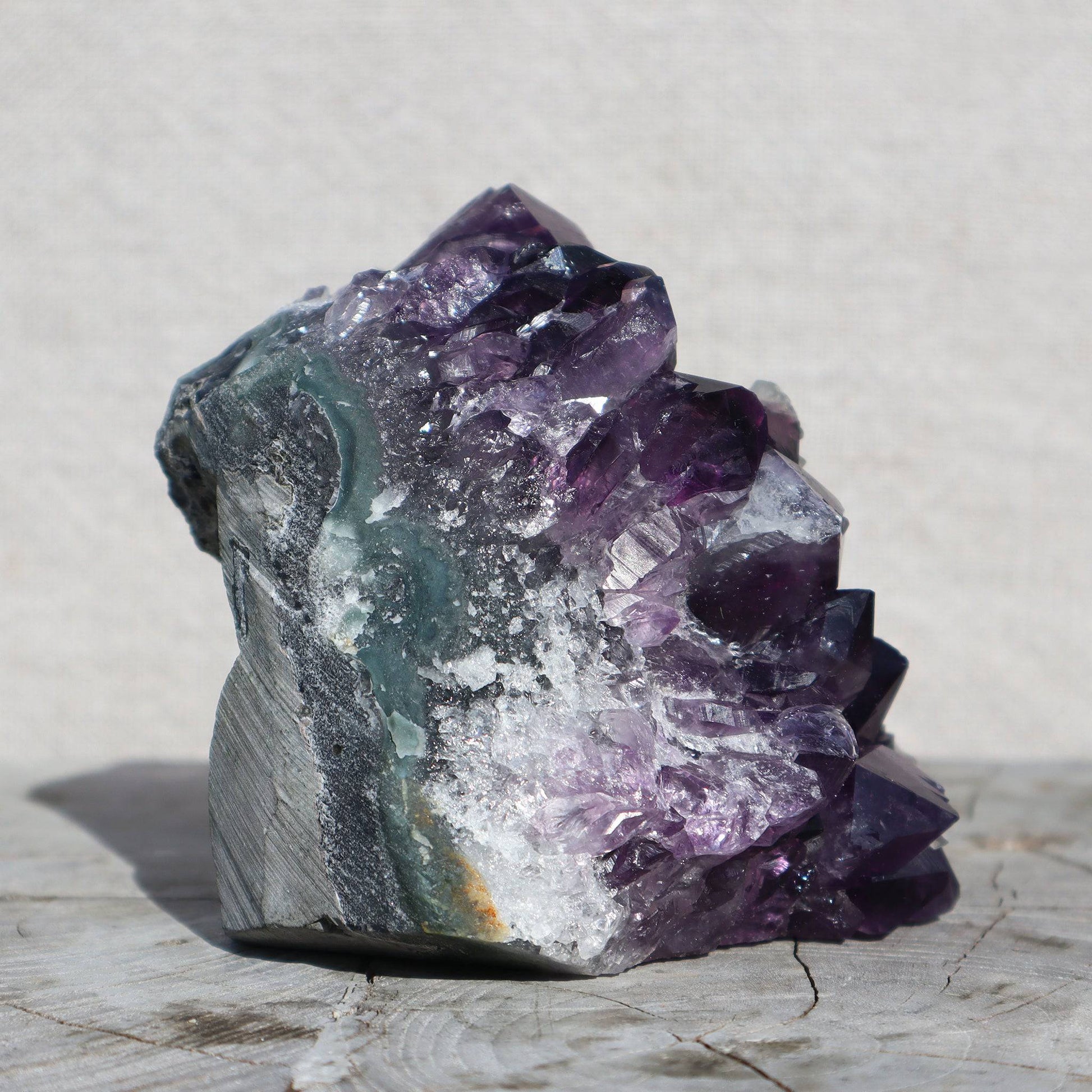 Raw_amethyst_quartz_crystals_calcite_cluster - Deepest_Earth