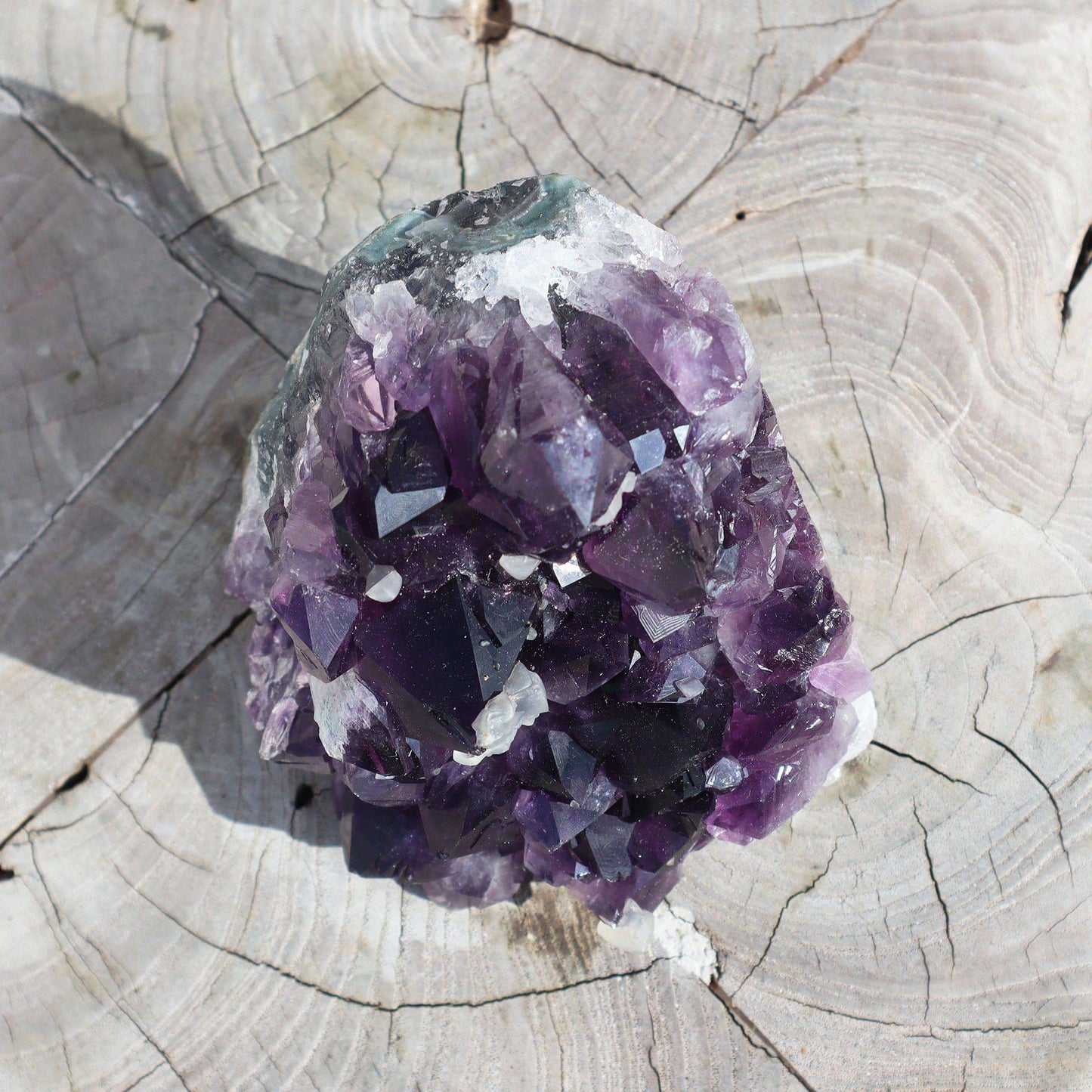 Raw_amethyst_quartz_crystals_calcite_cluster - Deepest_Earth