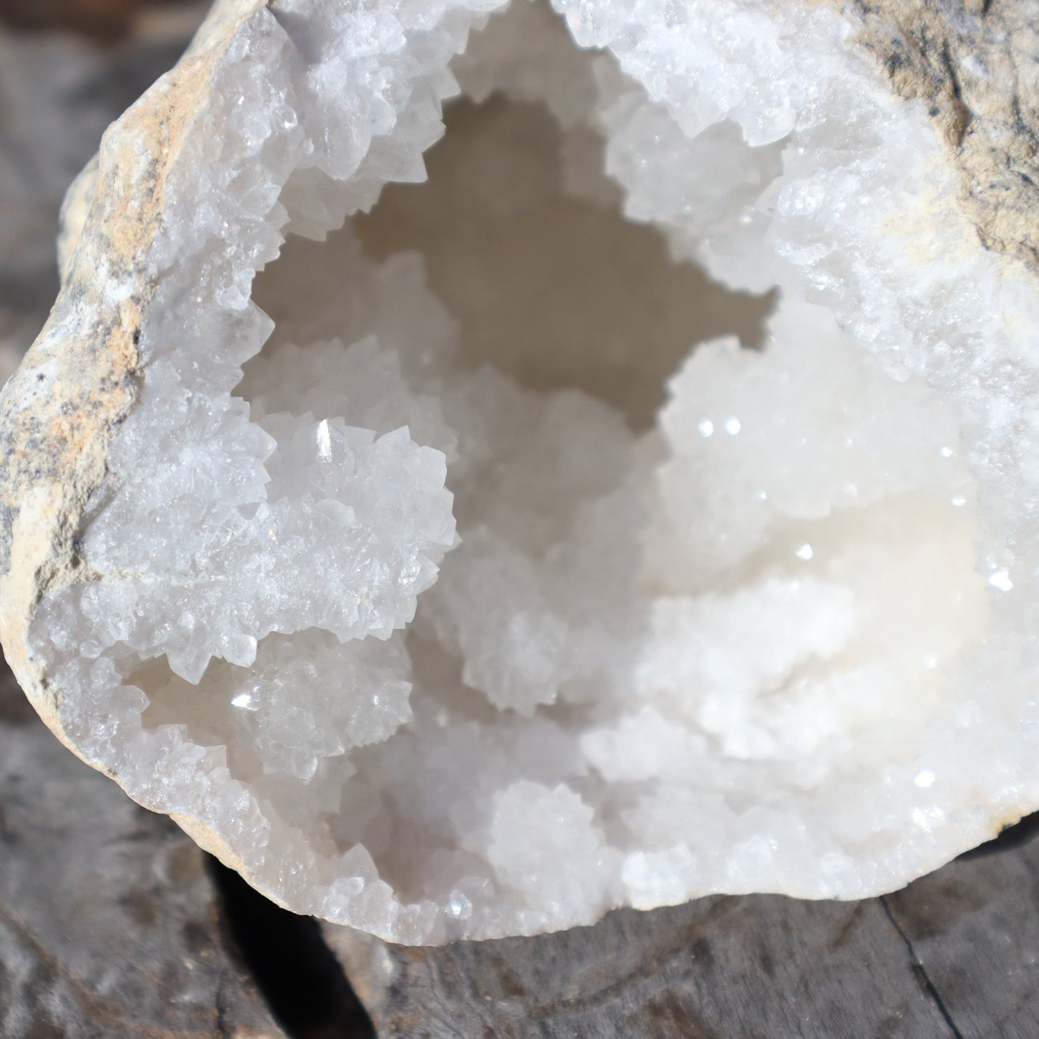 white moroccan desert geodes, raw outer shel and brilliant crystals