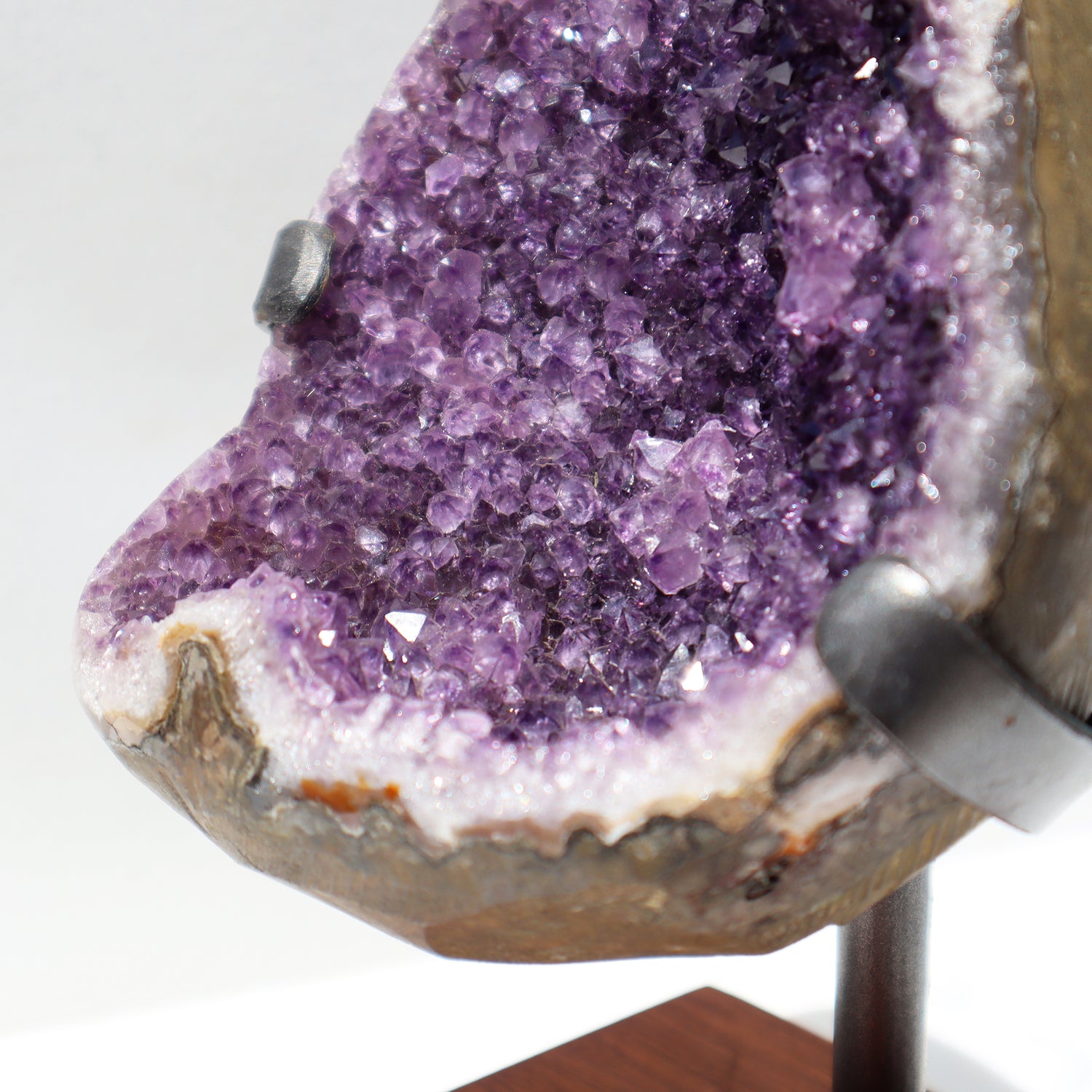 Amethyst geode fragment on customized stand