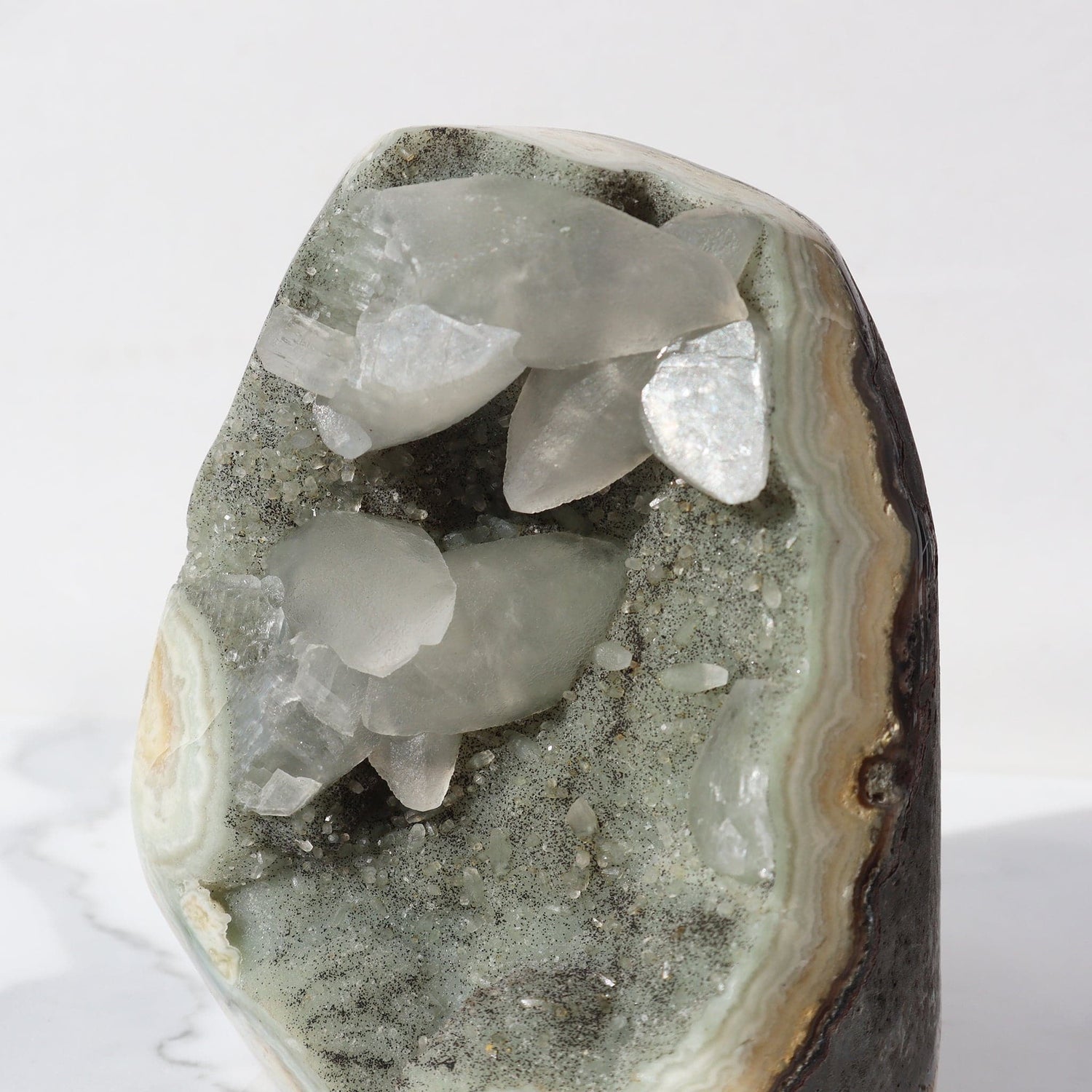 Quartz geode with green agate