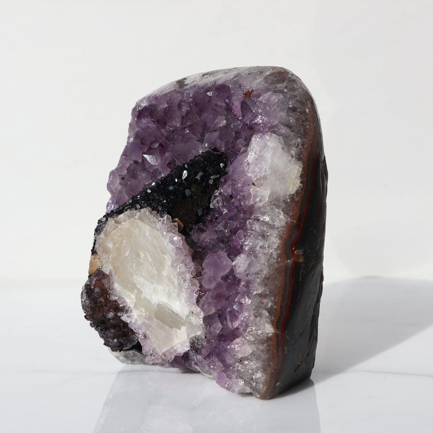 Icy Calcites Rare Amethyst Geode - Deepest Earth