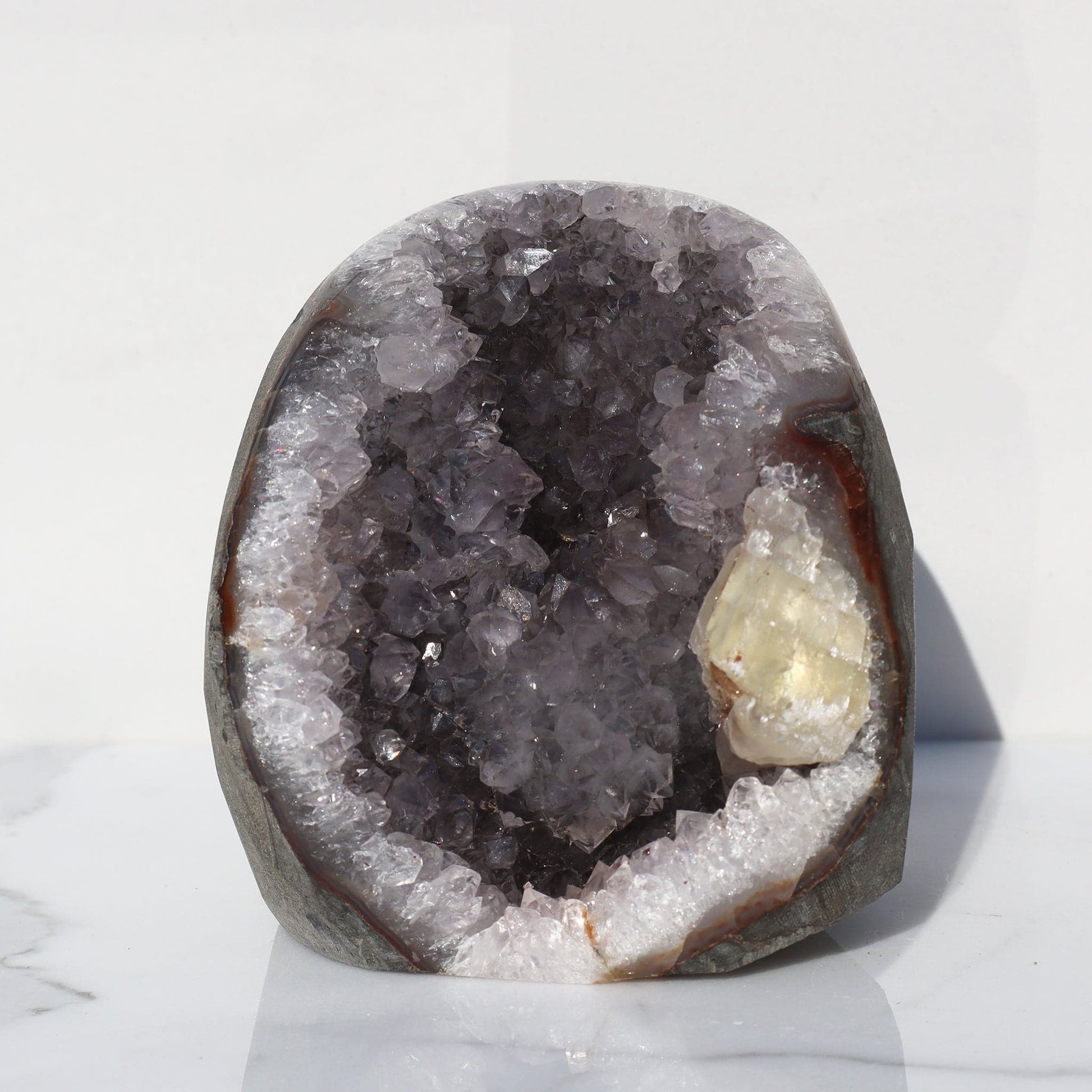 Calcite and Red Jasper Amethyst Geode l Deepest Earth