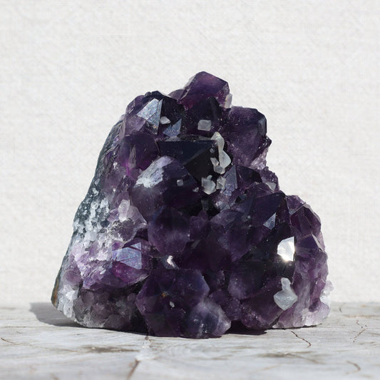 Raw_amethyst_quartz_crystals_calcite_cluster - Deepest_Earth