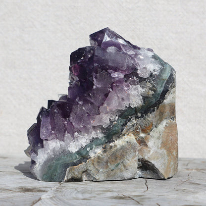Raw_amethyst_quartz_crystals_calcite_cluster - Deepest_Earth